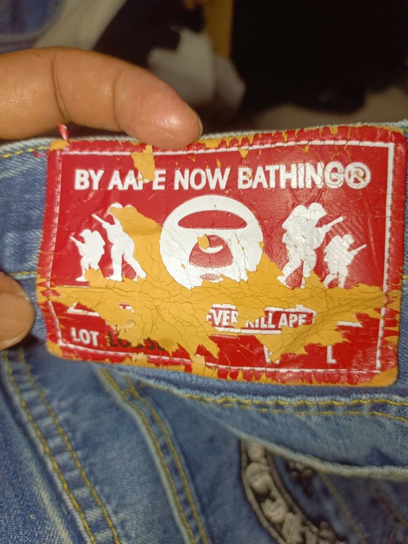 AAPE By A Bathing Ape Regular Fit Jeans (Category: Jeans) located in Makati City. Submitted by bawalburaot (Listing ID 1416778511, Image 2). Description: - Authentic AAPE By A Bathing Ape jeans - Regular fit - Classic blue wash - AAPE logo detail on back pocket and waistband - Size clearly indicated on tag - Made with quality denim for style and comfort Size 31.