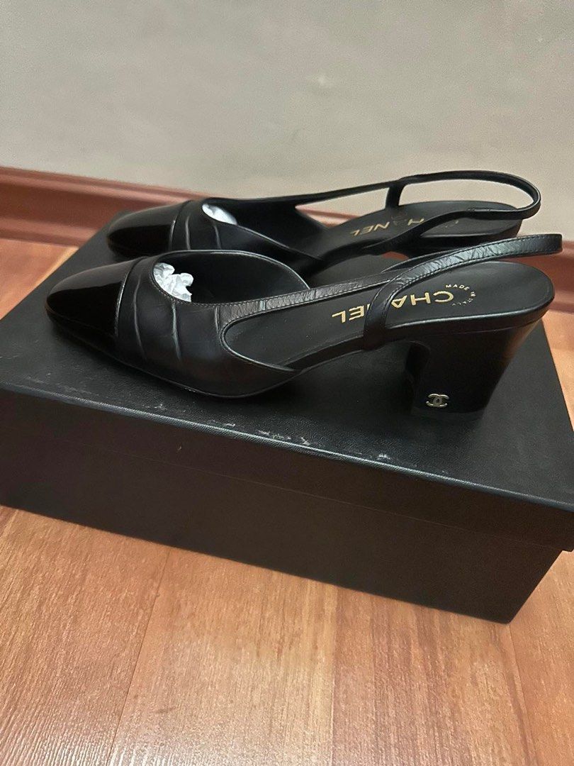 Authentic Chanel Slingback Heels (Category: Heels) located in Paranaque City. Submitted by msurfer (Listing ID 1416722767, Image 2). Description: Authentic Chanel sling black on black - size 38 - used twice w/ shoe protector - complete with dust bag and box .