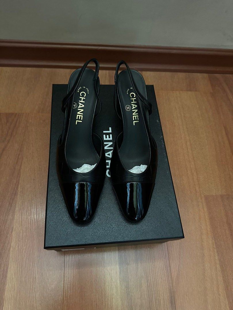 Authentic Chanel Slingback Heels (Category: Heels) located in Paranaque City. Submitted by msurfer (Listing ID 1416722767, Image 1). Description: Authentic Chanel sling black on black - size 38 - used twice w/ shoe protector - complete with dust bag and box .