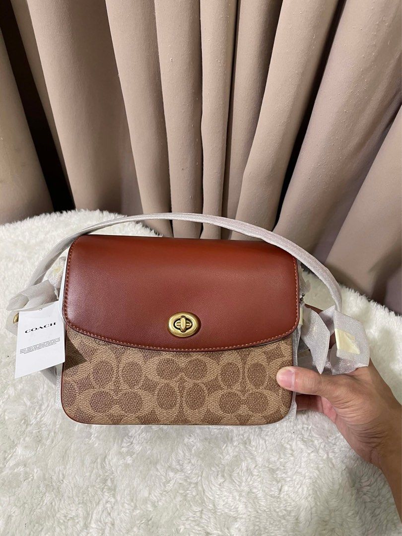 Authentic Coach cassie in signature tan (Category: Luxury Bags & Wallets) located in Arayat. Submitted by livetothefullest_497 (Listing ID 1416788507, Image 1). Description: Original pasabuy from Canada Rfs: Need fund pm for details.