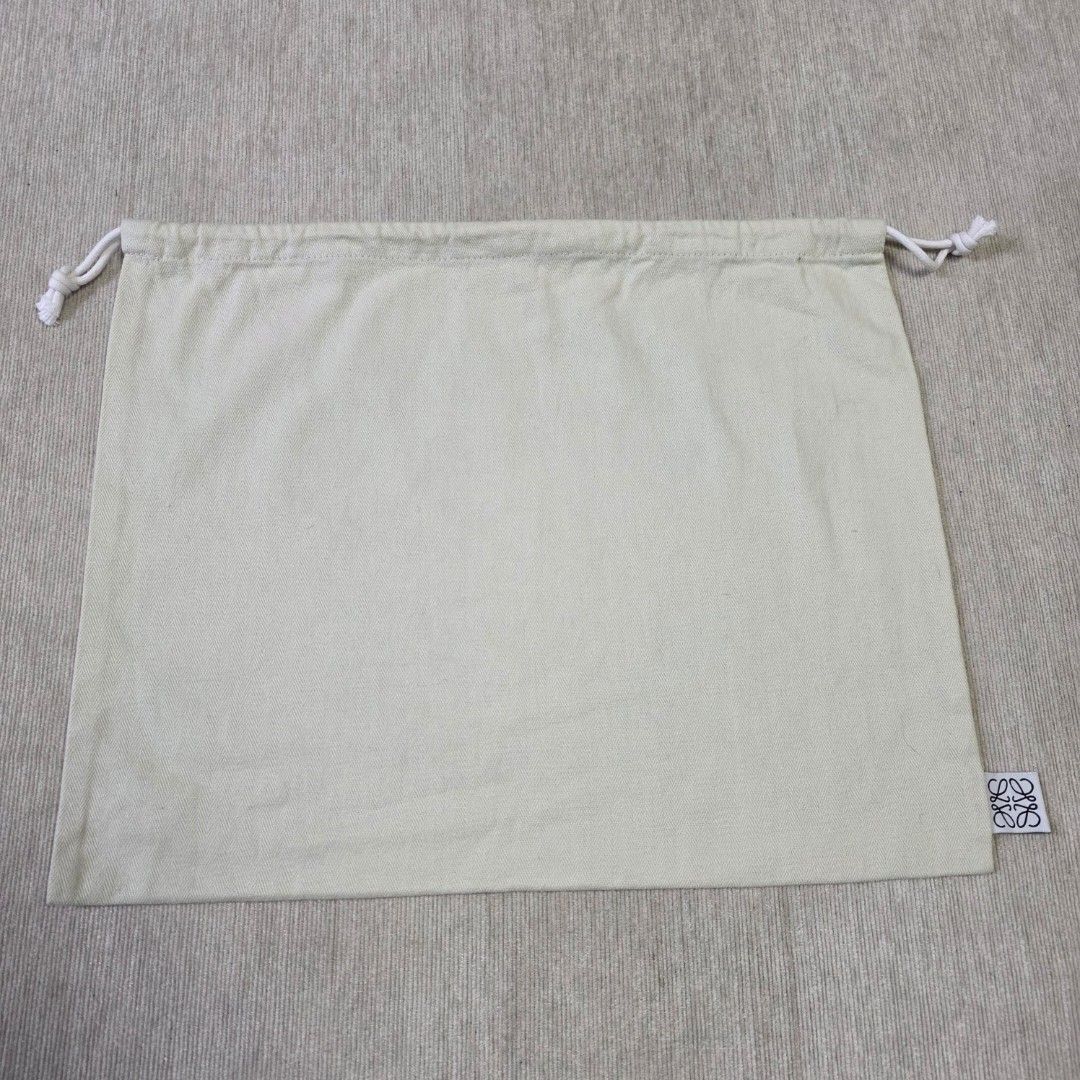 Authentic Loewe dust bag 11.5x14.5 inches (Category: Cross-body Bags) located in Manila. Submitted by jfluxury.co (Listing ID 1416831770, Image 2). Description: excellent condition like new no flaws bought in Japan 🇯🇵 💯% Authentic. 😊 Money back guarantee. 😊 Clean and ready to use na.