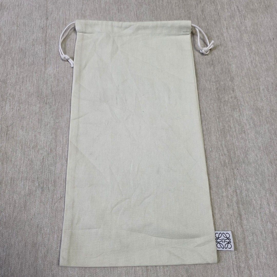 Authentic Loewe dust bag 15x8 inches (Category: Purses & Pouches) located in Manila. Submitted by jfluxury.co (Listing ID 1416831659, Image 2). Description: excellent condition like new no flaws bought in Japan 🇯🇵 💯% Authentic. 😊 Money back guarantee. 😊 Clean and ready to use na.