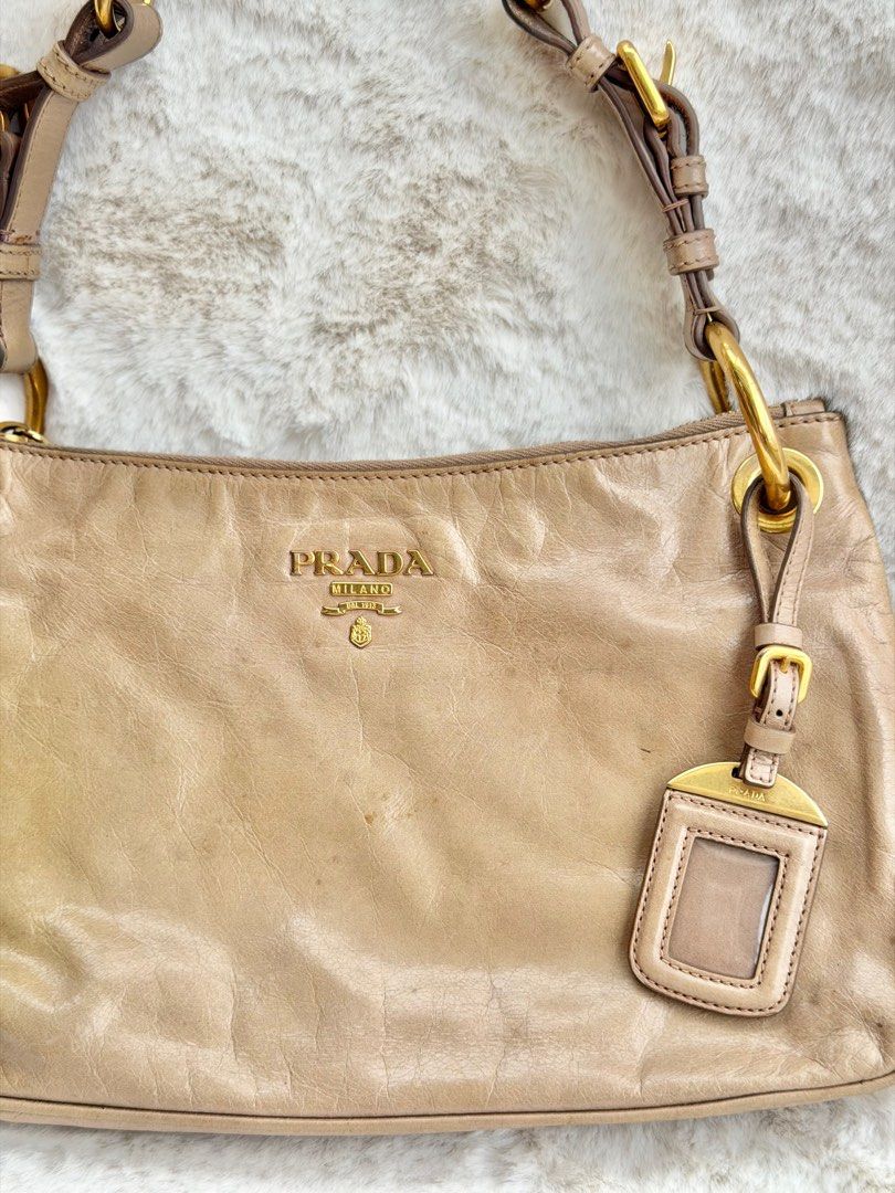 Authentic PRADA Vitello Shine Baguette Shoulder Bag (Category: Luxury Bags & Wallets) located in Malolos. Submitted by theroyalrunwayph (Listing ID 1416782601, Image 3). Description: Authentic. White tag still intact. Minor flaws on hardware. Very pretty. Classy and pretty color..