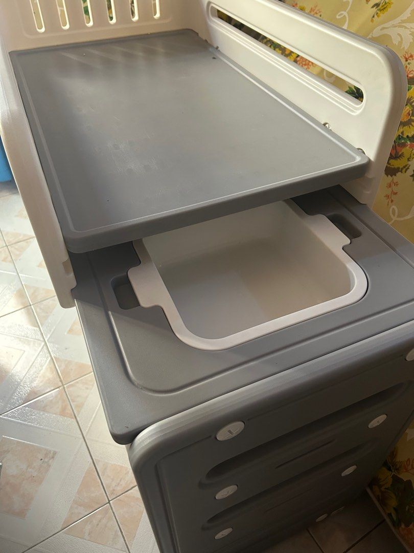 Baby Changing Table with wash basin (Category: Changing Mats & Accessories) located in Cabanatuan. Submitted by krnlim (Listing ID 1416772785, Image 3). Description: - Changing surface with raised edges for safety - Multiple drawers for storage - Mounted on wheels for easy movement - With wash basin - Neutral color scheme RFS : not using anymore.
