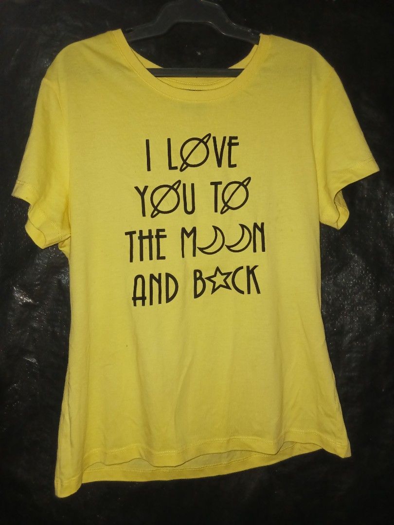 BNY Jeans Yellow Graphic Tee - Large (Category: Tshirts & Polo Shirts ) located in Naga. Submitted by havenaid (Listing ID 1416783435, Image 1). Description: Bright yellow graphic tee with a cute “I love you to the moon and back” print. The color is still vibrant and the shirt is structurally okay despite its age. Please note: this is an older shirt and has visible stains. I’m not sure if the stains are washable, so selling as-is. Still good for 