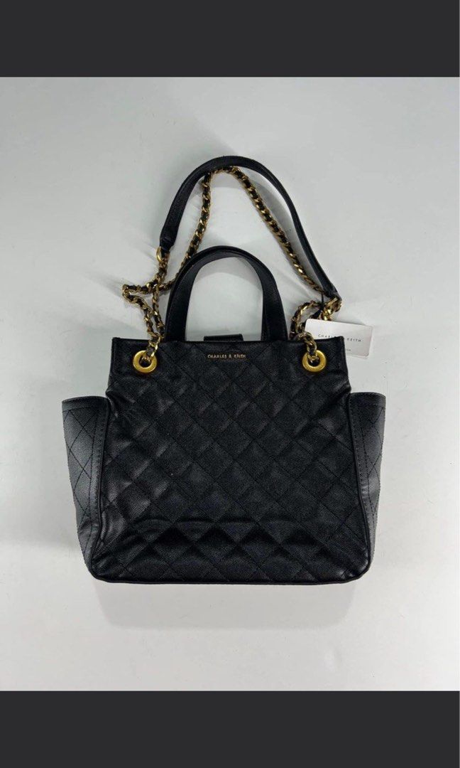 Ch@rlesKeith Quilted Chain Handle Bag (Category: Luxury Bags & Wallets) located in Taguig. Submitted by sshyn_08 (Listing ID 1416659764, Image 1). Description: - Charles & Keith handbag - Black quilted design - Chain and top handles - Diamond pattern - Side pockets - Charles & Keith logo visible - Includes original tag.
