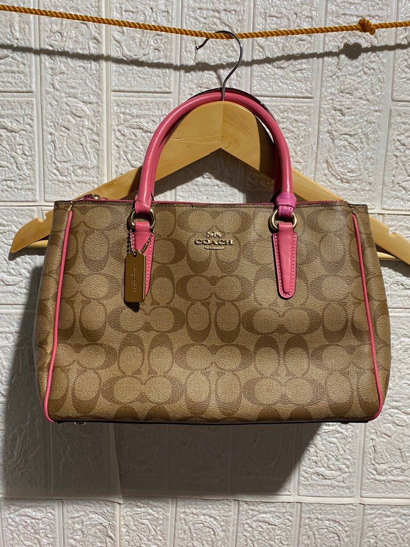 Coach Caryall Satchel Khaki Pink (Category: Luxury Bags & Wallets) located in Sindangan. Submitted by bossrapthrift (Listing ID 1416780585, Image 1). Description: Coach Caryall Satchel Khaki Pink Nasa Pic na All Details mga boss/madam With Minimal Issue Normal for Ukay Bag nasa last pic Loc:Zamboanga Del Norte.