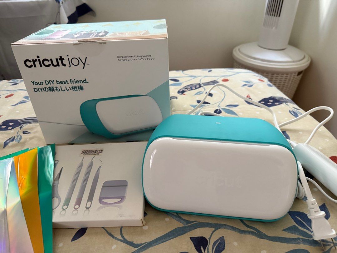 Cricut Joy Compact Cutting Machine (Category: Craft Supplies & Tools) located in San Pedro. Submitted by dhaest (Listing ID 1416647502, Image 1). Description: - Cricut Joy compact cutting machine (teal and white) - Includes tools and various vinyl sheets - Great for DIY projects and crafts RFS: declutter - last price na po..