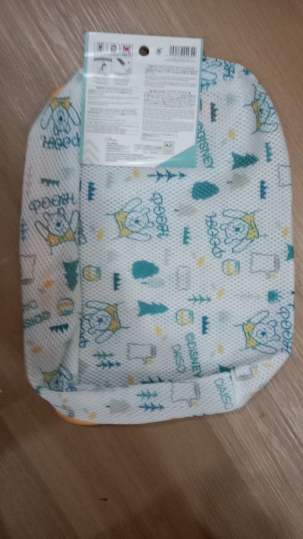 Daiso Disney Winnie the Pooh Laundry Net (Category: Laundry Baskets) located in Cebu City. Submitted by monsterheart (Listing ID 1416749687, Image 1). Description: Pooh laundry bag net med size.