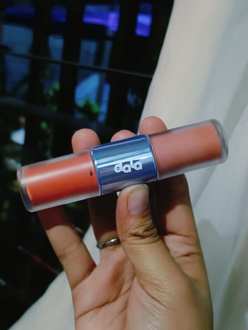 Dala Dewphoria Blush (Category: Makeup) located in Manila. Submitted by mariajanma32101 (Listing ID 1416809445, Image 1). Description: - Dola Dewphoria Lip & Cheek Tint - Dual-ended lipstick - Features a light blue band - Beautiful coral/peach shade - Includes original packaging - A must-have for your makeup kit!.