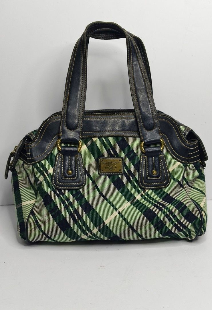 E-Land University Classic Hand Bag (Category: Luxury Bags & Wallets) located in Baguio. Submitted by PreiLoveMaria (Listing ID 1416827393, Image 2). Description: Classic Eland Univ Plaid Handbag Capture that British college style with this unique satchel! This Eland Univ bag features a stylish green and navy plaid canvas body with navy leather trim and sturdy top handles. Perfect for everyday use. Condition: Good used condition, well-maintained w