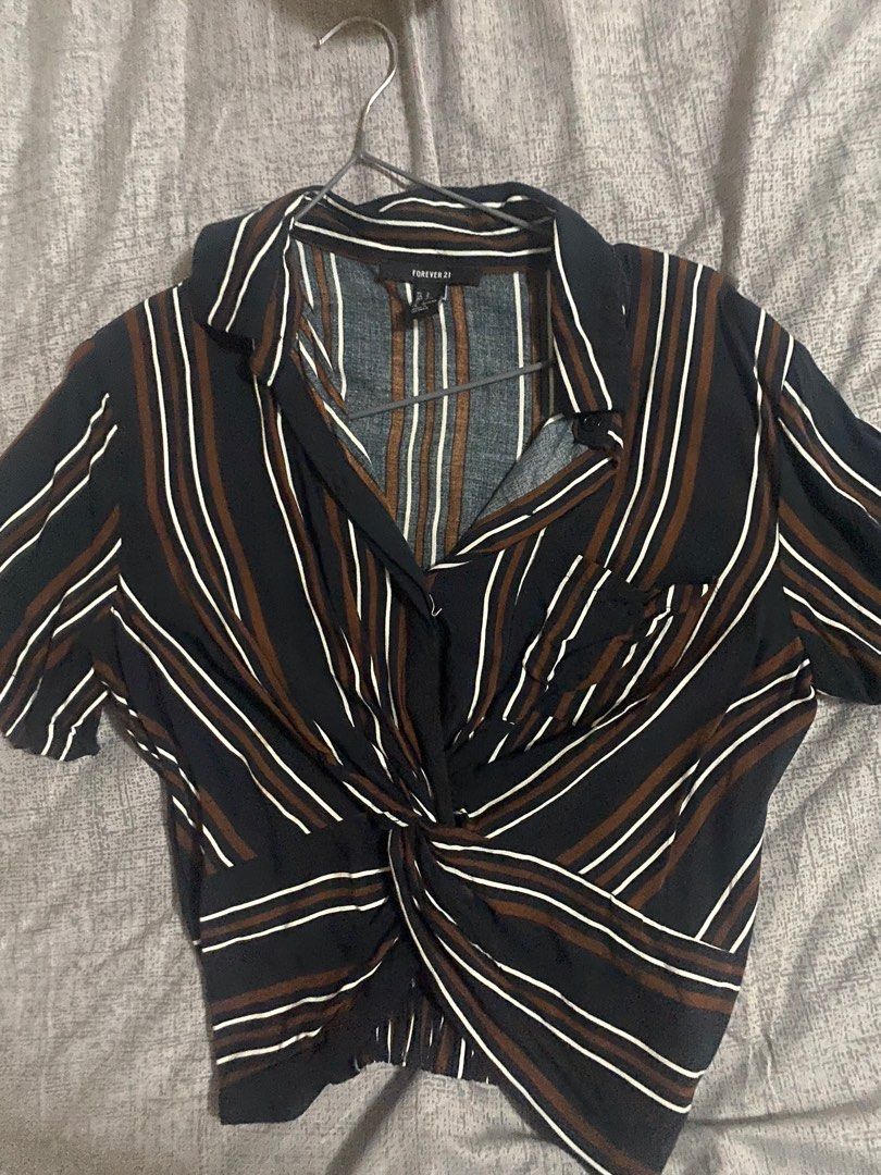 forever 21 polo cropped (Category: Blouses) located in Quezon City. Submitted by decluttercollection01 (Listing ID 1416715677, Image 1). Description: black brown white polo cropped rfs decluttering.