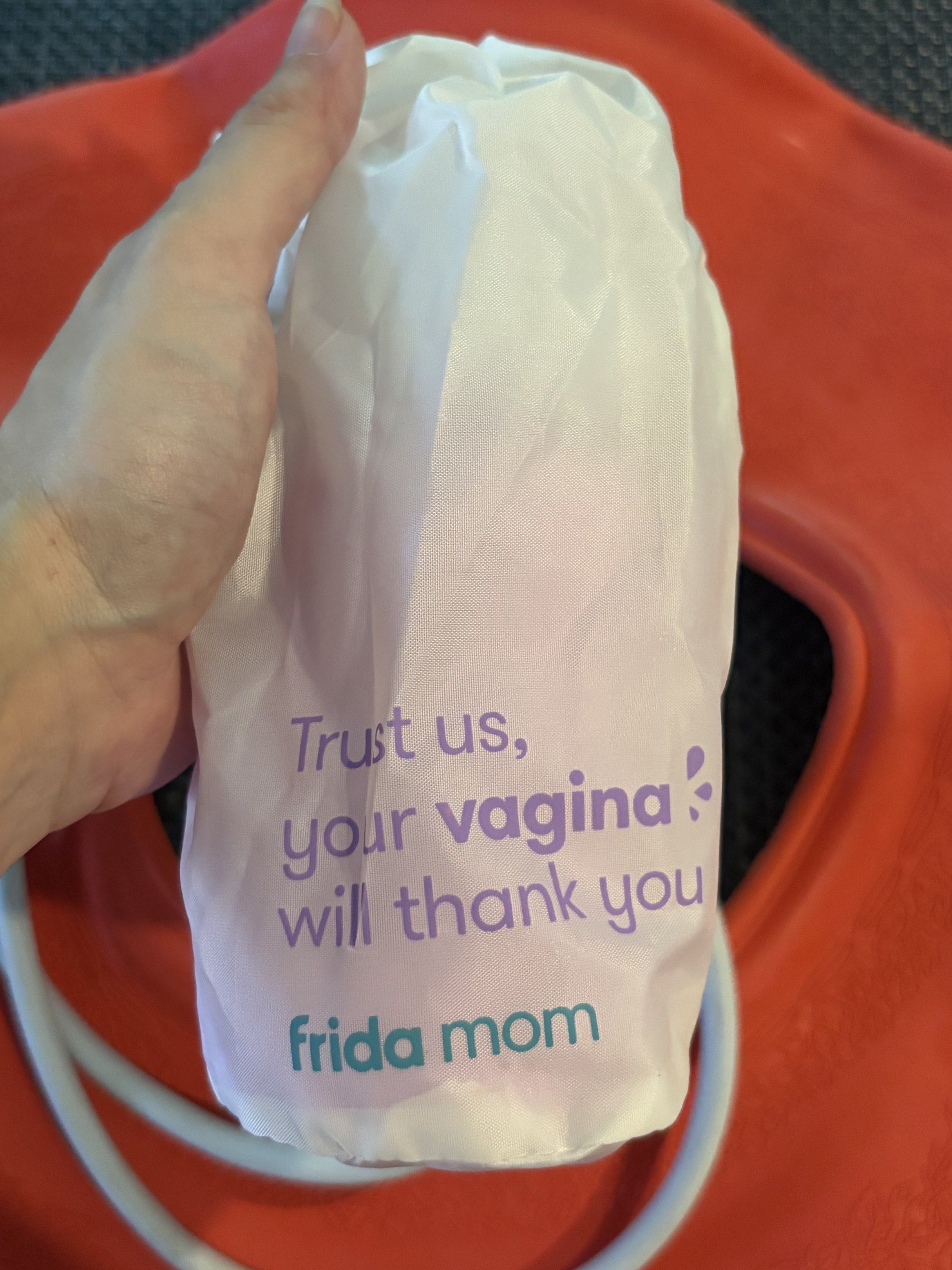 Frida Mom Upside Down Peri Bottle & Postpartum Seat (Category: Maternity Care) located in Paranaque City. Submitted by brattina (Listing ID 1416731588, Image 1). Description: - Frida Mom Upside Down Peri Bottle for postpartum care - Includes travel bag - Designed for portable bidet perineal cleansing and recovery - Red postpartum seat for comfort - Ideal for postpartum recovery FRIDA MOM Upside Down Peri Bottle for Postpartum Care, Portable Bidet