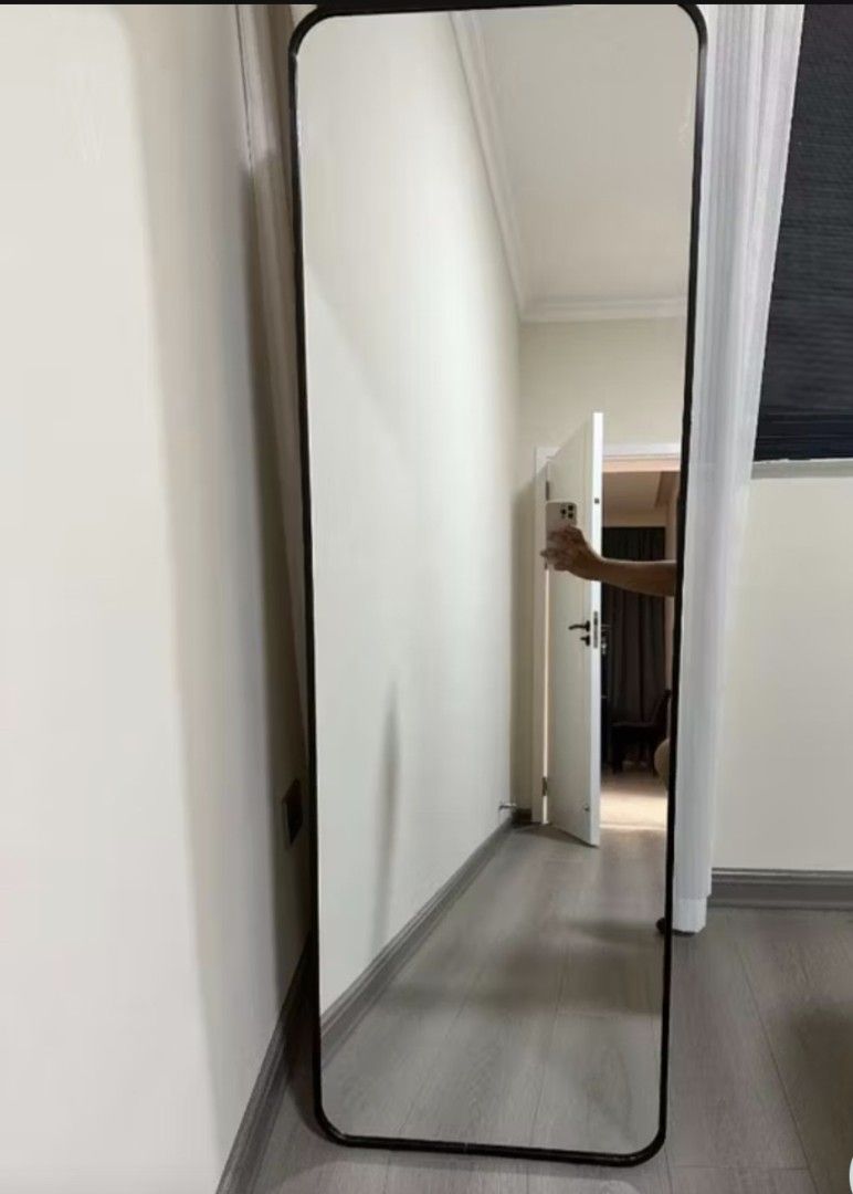 Full Length Mirror with Black / White Frame.. Cod . SAMEDAY DELIVERY ✅️ (Category: Mirrors) located in Manila. Submitted by juliemarce22943 (Listing ID 1416722033, Image 1). Description: Stylish full-length mirror with a sleek black/White frame. The mirror has rounded corners and a rectangular shape. It's perfect for bedrooms, living rooms, or entryways. The mirror provides a clear reflection and can be leaned against a wall or mounted. It's a gr
