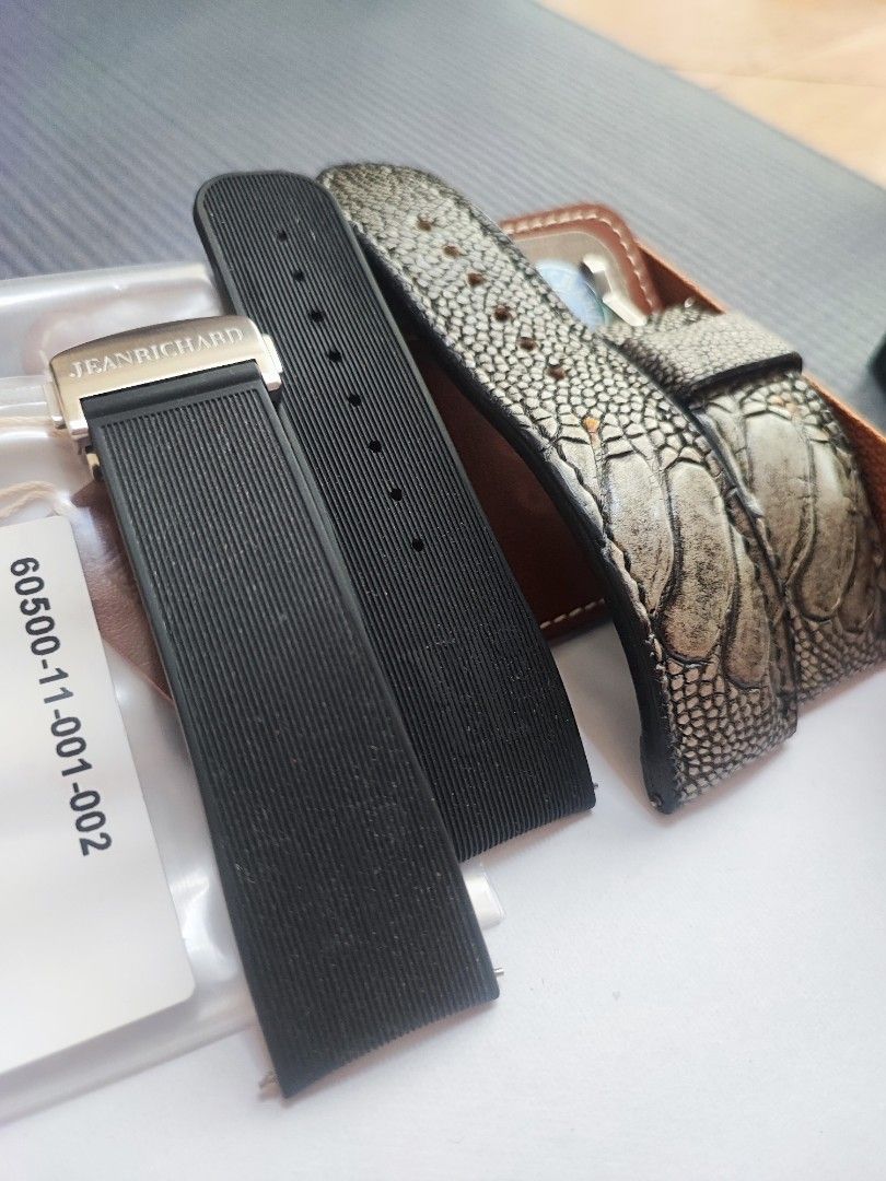 JeanRichard Terrascope Watch with Extra Straps (Category: Luxury Watches) located in Cebu City. Submitted by petegohan (Listing ID 1416706351, Image 3). Description: - JeanRichard Terrascope watch - Silver dial - Brown leather strap - Additional straps: - Black rubber - Green leather with blue stitching - Textured light-colored strap - Includes leather watch case and leather card holder - Comes with original tags.