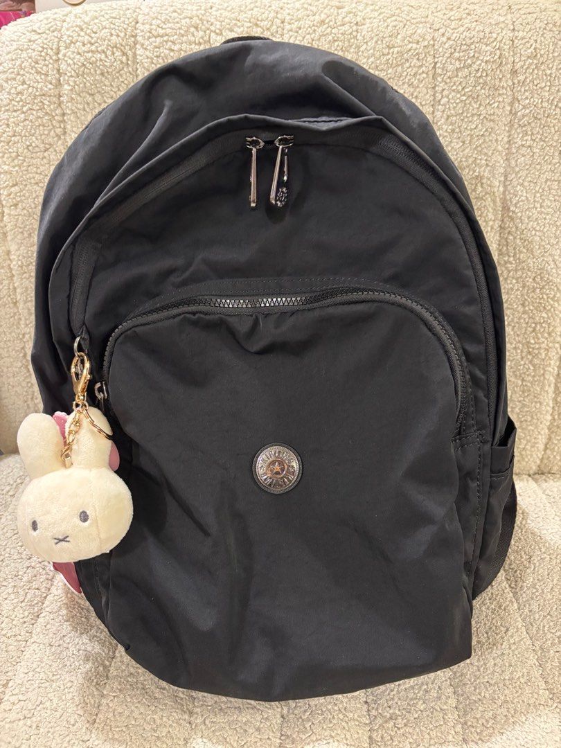 Kipling Black Backpack (Category: Backpacks) located in Singapore. Submitted by rabbitwillow (Listing ID 1416680922, Image 1). Description: - Stylish black Kipling backpack - Multiple compartments for organization (a compartment specifically for laptop) - Features front and side pockets - Ideal for commute, everyday use or travel (Miffy charm not included, just for illustration purpose, there is a original charm from Kipling included) Free light 