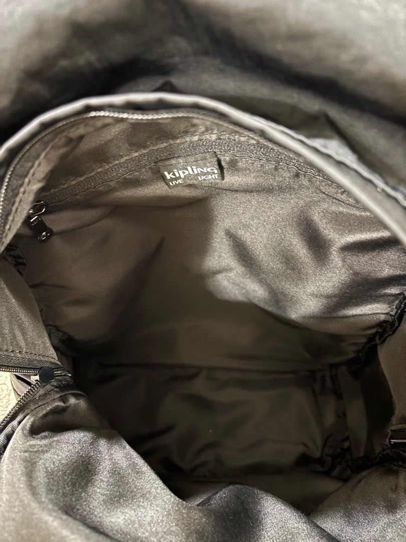 Kipling Black Backpack (Category: Backpacks) located in Singapore. Submitted by rabbitwillow (Listing ID 1416680922, Image 3). Description: - Stylish black Kipling backpack - Multiple compartments for organization (a compartment specifically for laptop) - Features front and side pockets - Ideal for commute, everyday use or travel (Miffy charm not included, just for illustration purpose, there is a original charm from Kipling included) Free light 