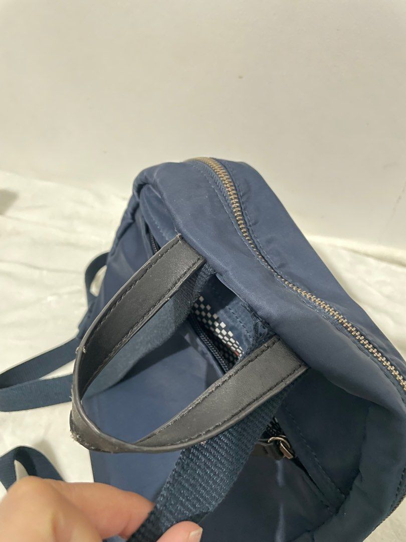 Kipling Navy Blue Backpack (Category: Backpacks) located in Manila. Submitted by reloom (Listing ID 1416760150, Image 3). Description: - Navy blue Kipling backpack - Main compartment with zipper closure - Front pocket with zipper closure - back pocket with zipper closure - Top handle - Includes Kipling monkey keychain - Straps show some wear (see picture) - Perfect for everyday use.