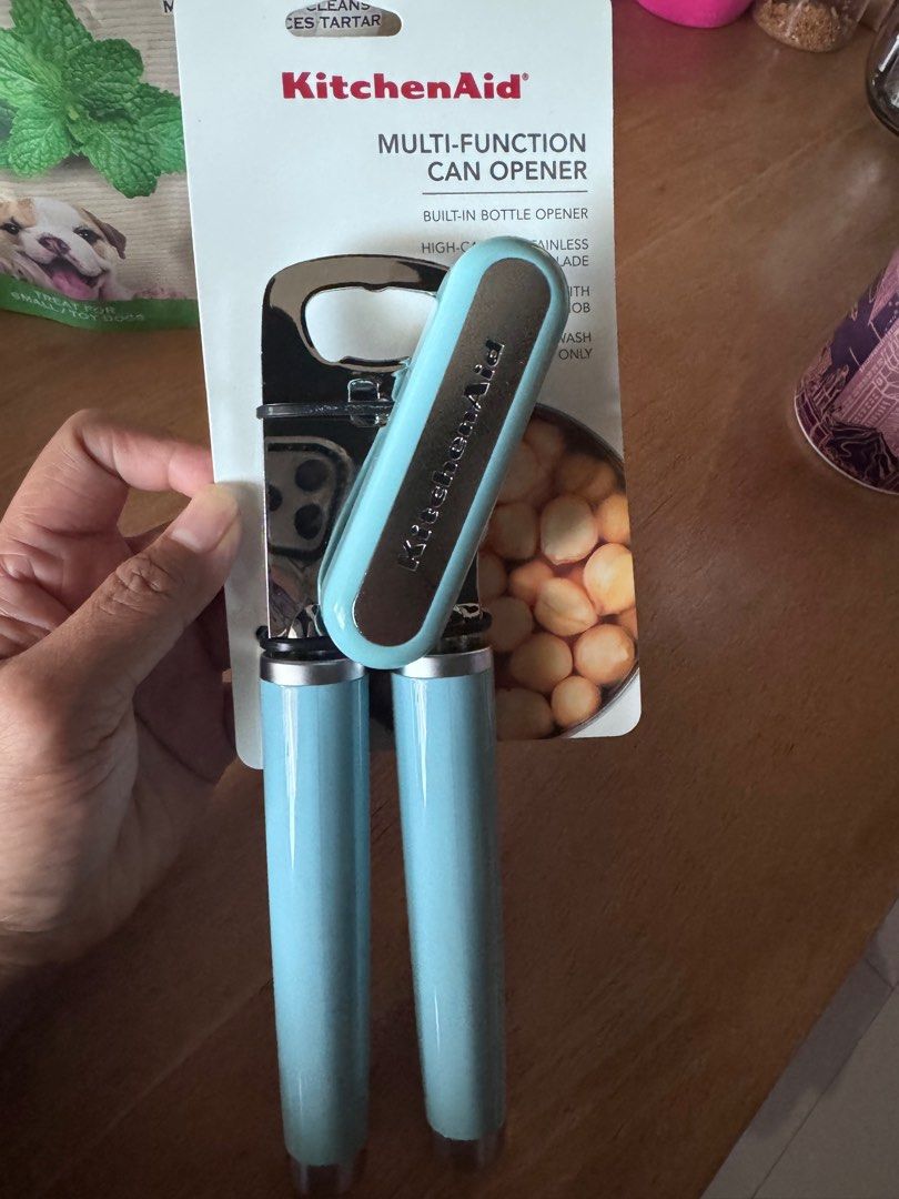 KitchenAid Multi-Function Can Opener (Category: Other Kitchenware & Tableware) located in Manila. Submitted by camshomecollections888 (Listing ID 1416698531, Image 2). Description: - KitchenAid multi-function can opener - Built-in bottle opener - High-carbon stainless steel blade - Easy crank with oversized knob - Light blue handle - Hand wash only.