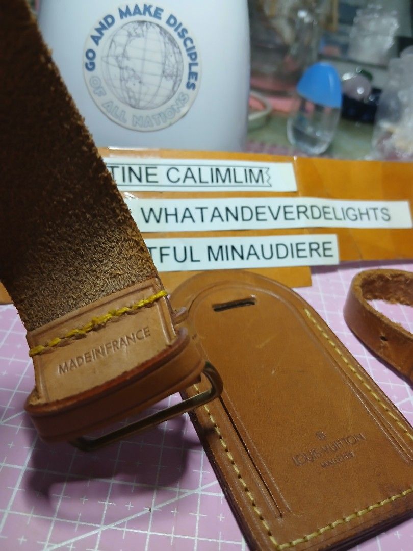 Louis Vuitton Luggage Tag with Strap (Category: Luxury Bags & Wallets) located in San Pedro. Submitted by whatandeverdelights (Listing ID 1416642060, Image 2). Description: - Authentic Louis Vuitton luggage tag - Includes strap with buckle and longer strap - Features Louis Vuitton logo and "Made in France" stamp - Leather shows some wear - Adds a touch of luxury to your luggage - All sales final.