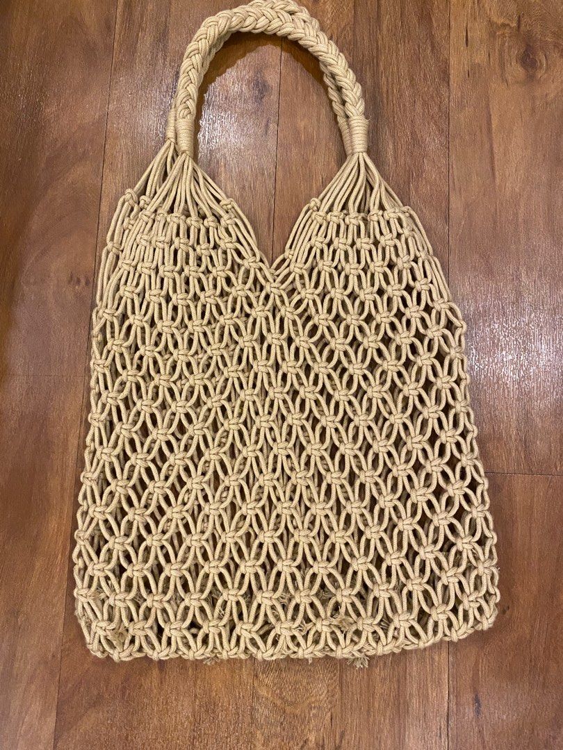 Macrame Tote Bag (Category: Tote Bags) located in Las Pinas. Submitted by mimachay (Listing ID 1416774042, Image 1). Description: - Macrame tote bag - Neutral beige color - Woven design - Braided handle - Perfect for everyday use - Stylish and versatile accessory.