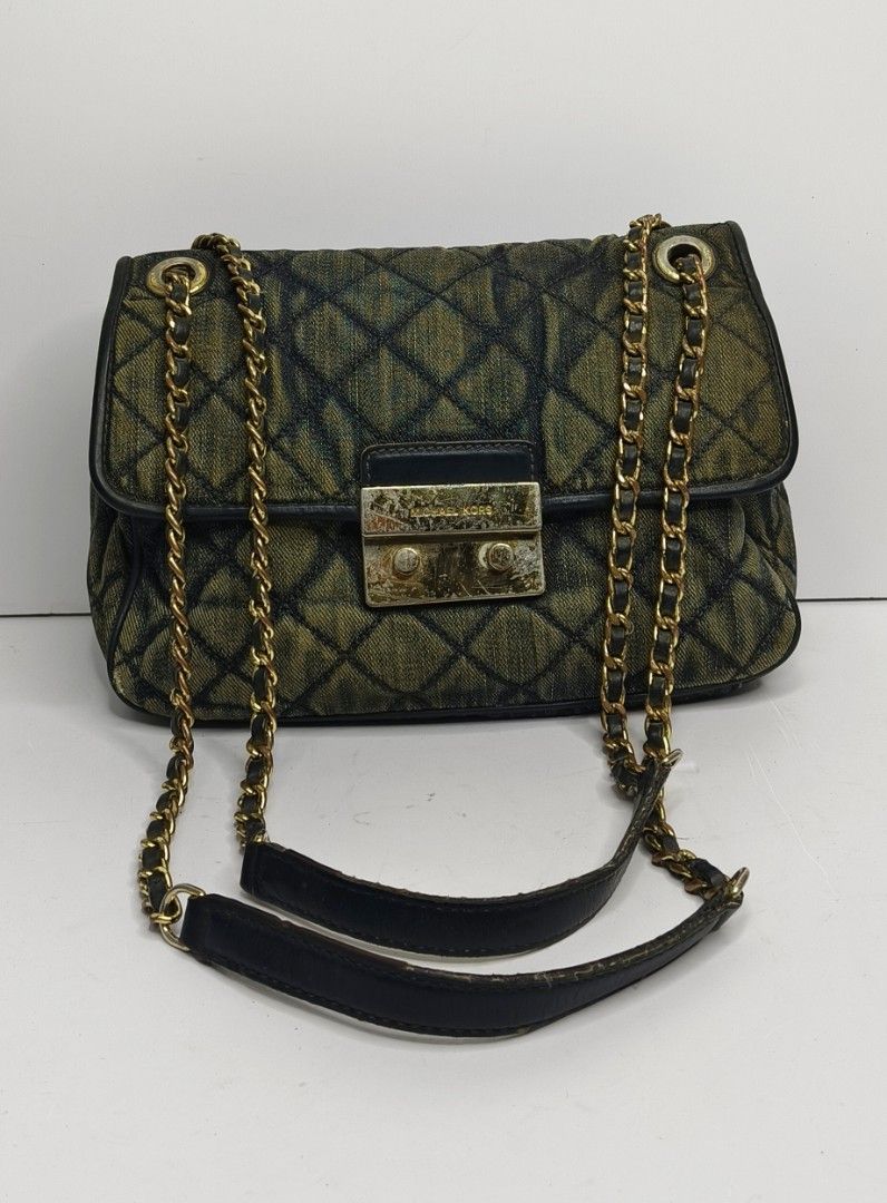 Michael Kors Sloan Denim Chain Bag (Category: Luxury Bags & Wallets) located in Baguio. Submitted by PreiLoveMaria (Listing ID 1416824942, Image 2). Description: Michael Kors Sloan Denim Bag This Sloan Denim bag features a classic diamond quilted pattern. 👜 Condition: Good used condition • Normal signs of wear • Visible scratches on the hardware Kindly check the Detailed photos Shipping via J&T only No COD and COP ❤️.