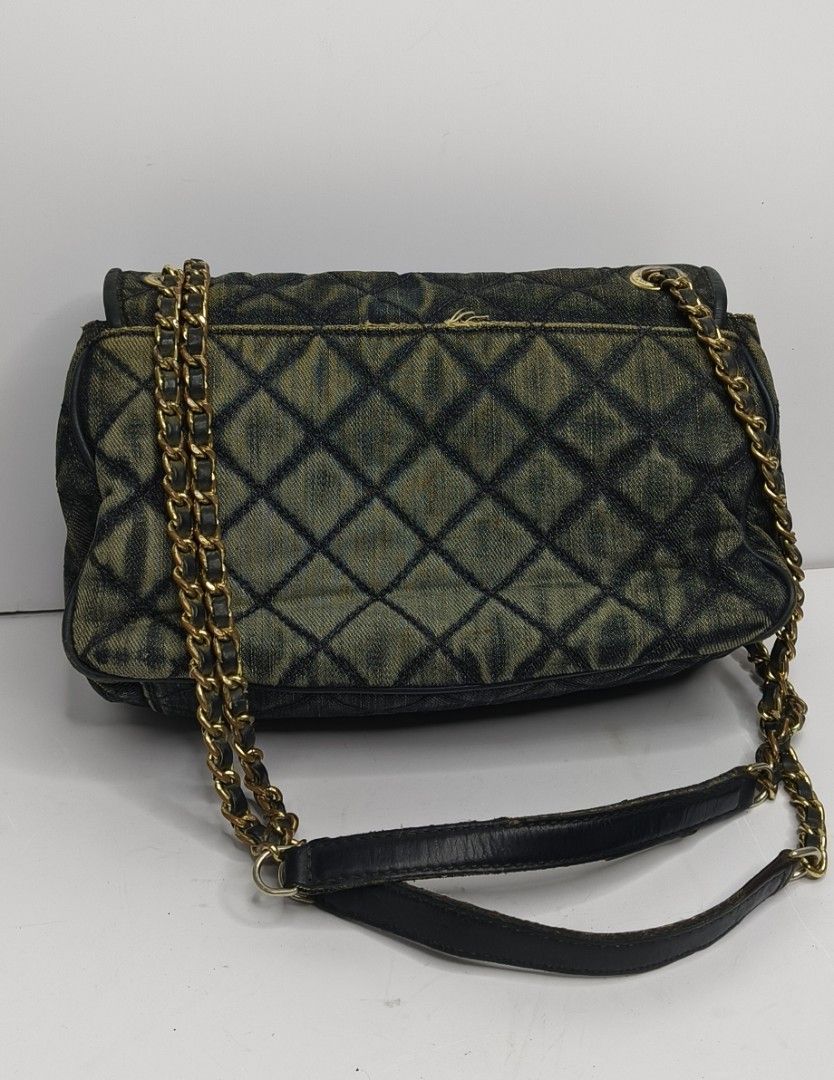 Michael Kors Sloan Denim Chain Bag (Category: Luxury Bags & Wallets) located in Baguio. Submitted by PreiLoveMaria (Listing ID 1416824942, Image 3). Description: Michael Kors Sloan Denim Bag This Sloan Denim bag features a classic diamond quilted pattern. 👜 Condition: Good used condition • Normal signs of wear • Visible scratches on the hardware Kindly check the Detailed photos Shipping via J&T only No COD and COP ❤️.