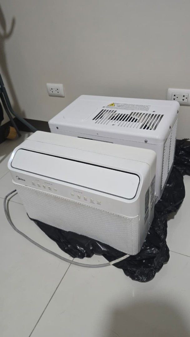 Midea Window Type Air Conditioner (Category: Air Conditioning and Heating) located in Quezon City. Submitted by ramiph14 (Listing ID 1416648154, Image 1). Description: - Midea window-type air conditioner - Includes top cover - Visible power cord - Ready for installation Taguig area.
