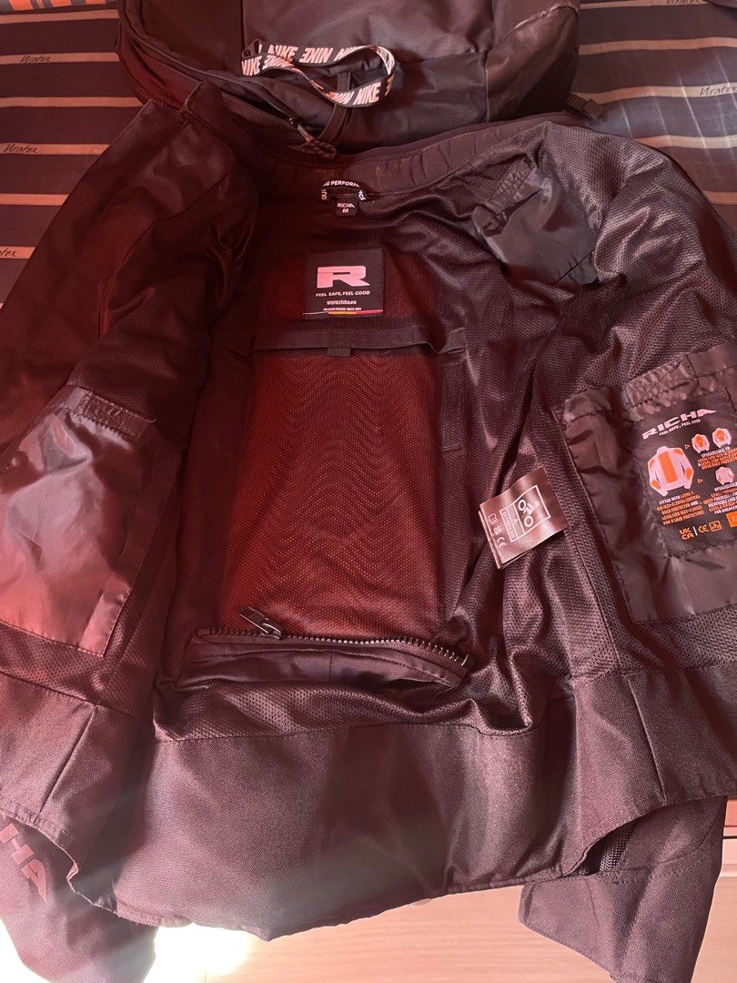 Richa Motorcycle Jacket (Category: Coats, Jackets and Outerwear) located in Quezon City. Submitted by es0nn (Listing ID 1416725032, Image 3). Description: RUSH - Black Richa motorcycle jacket - Mesh lining - Multiple pockets - Reflective accents - Richa logo (front and back) - Zipper closure - Adjustable cuffs - Minor wear on mesh material.