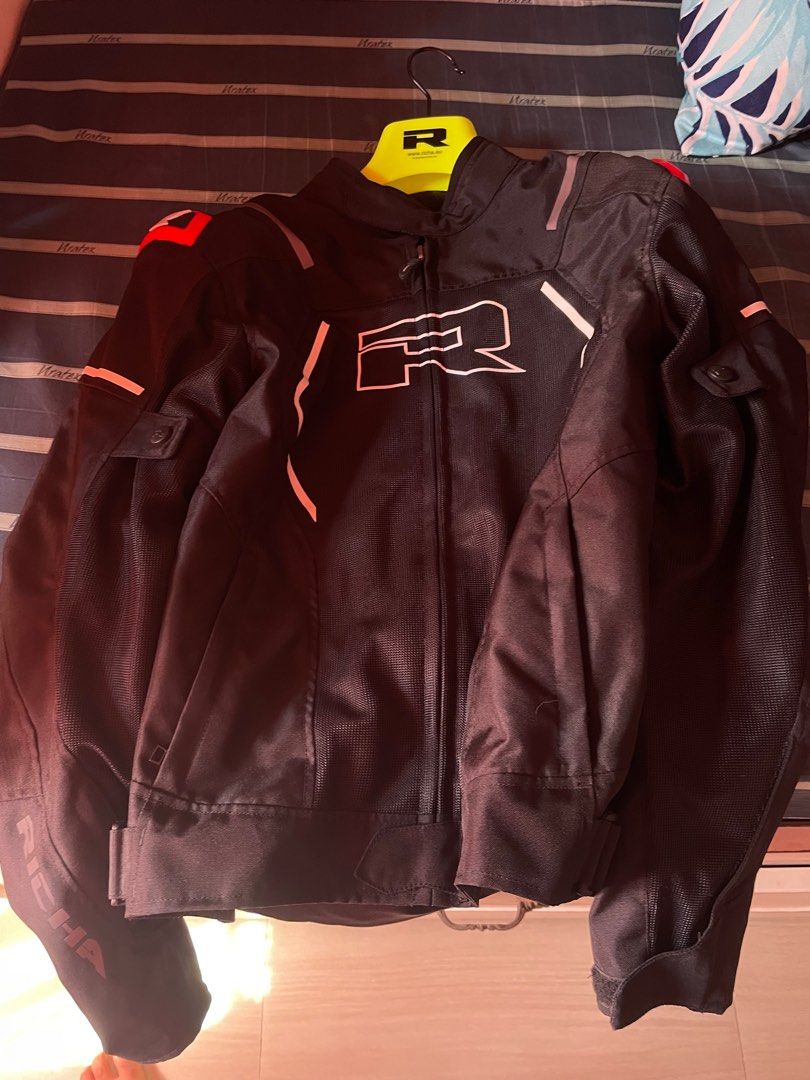 Richa Motorcycle Jacket (Category: Coats, Jackets and Outerwear) located in Quezon City. Submitted by es0nn (Listing ID 1416725032, Image 1). Description: RUSH - Black Richa motorcycle jacket - Mesh lining - Multiple pockets - Reflective accents - Richa logo (front and back) - Zipper closure - Adjustable cuffs - Minor wear on mesh material.