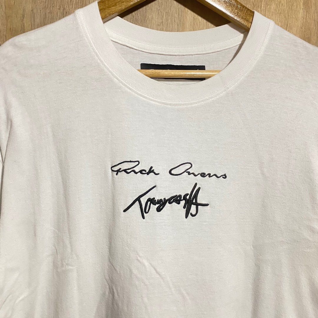 Rick Owens x Tommy Cash (Category: Tshirts & Polo Shirts ) located in Manila. Submitted by drp4drp (Listing ID 1416698597, Image 3). Description: Length: 29 Width: 23 Honest issue: see the photos - Rick Owens white t-shirt - Features: - Signature on front - Multiple signatures on back - Rick Owens logo tag - Style: Crew neck, short sleeves - Material: Cotton.