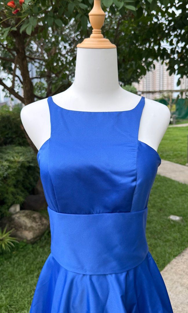For Rent: Royal Blue Evening Gown (Category: Evening dresses & gowns) located in Makati City. Submitted by stylebliss (Listing ID 1416642785, Image 2). Description: For Rent: - Royal blue evening gown - Fitted bodice with square neckline - Wide waistband - Floor-length skirt with slight train - Delicate spaghetti straps - Zipper closure - Perfect for formal events and special occasions.