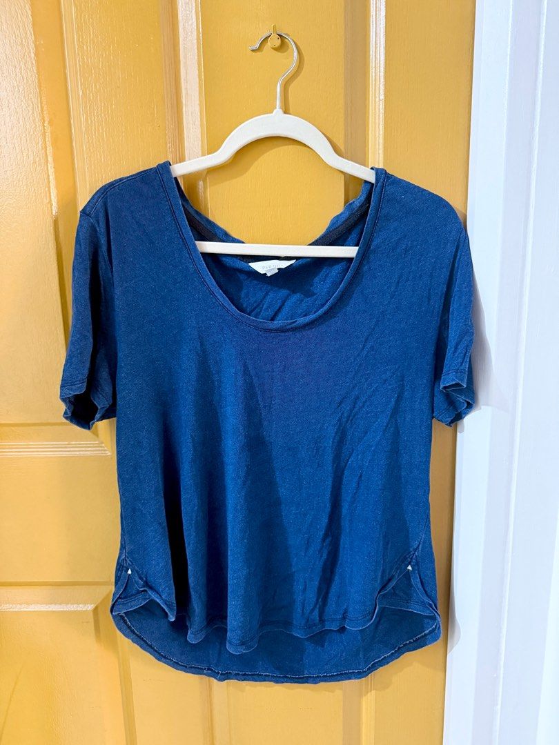 Scoop Neck T-shirt Blue (Category: Shirts) located in Taguig. Submitted by misskyleee (Listing ID 1416729758, Image 1). Description: - Per Una navy blue t-shirt - Scoop neck - Short sleeves - Size 10 - Relaxed fit - Soft, lightweight fabric - Curved hem - Made in India - Simple, classic design - Perfect for casual wear.