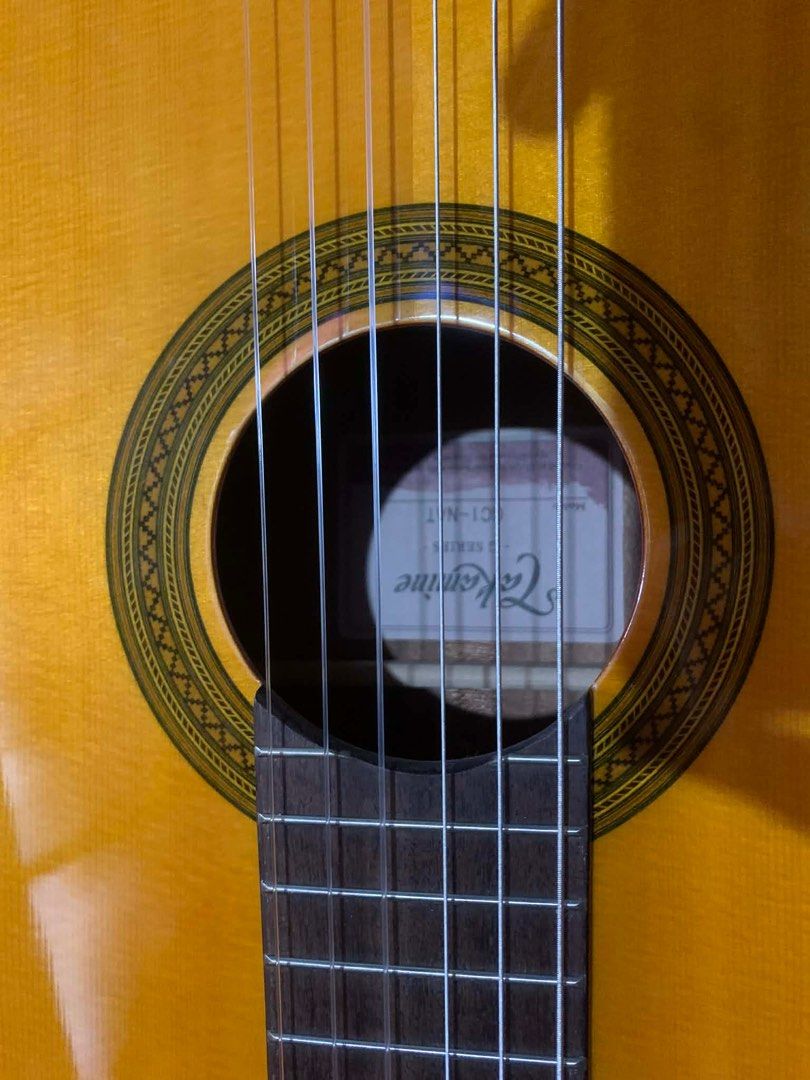 Takamine Classical Guitar (Category: Musical Instruments) located in Cavite. Submitted by thriftandthrive26 (Listing ID 1416744959, Image 3). Description: ❗️BRAND NEW❗️ Reason for Selling: Nag kamali ng bili hindi pa nagagamit meron po yan resibo kung kailan na bili Meet up po around MOA,Laspiñas, Alabang - Takamine classical guitar - Natural finish - Spruce top - Mahogany back and sides - Laurel fingerboard - Chrome tuners with white pearl butto