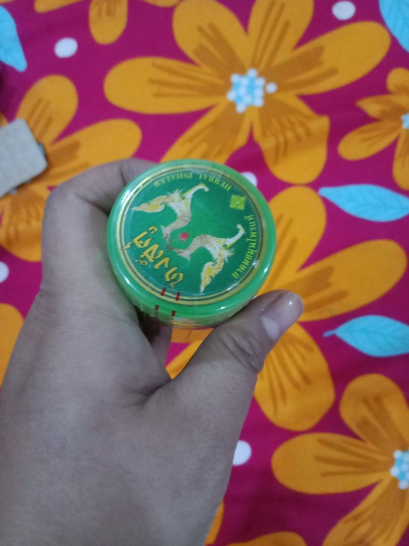 Thong Sut Herbal Balm (Category: Body Care) located in Cebu City. Submitted by monsterheart (Listing ID 1416744706, Image 3). Description: - Thong Sut Herbal Balm - 10g - For congestion and colds - Expiry Date: 04/2027 - Features a green jar with gold accents and Thai text. -inhaler .