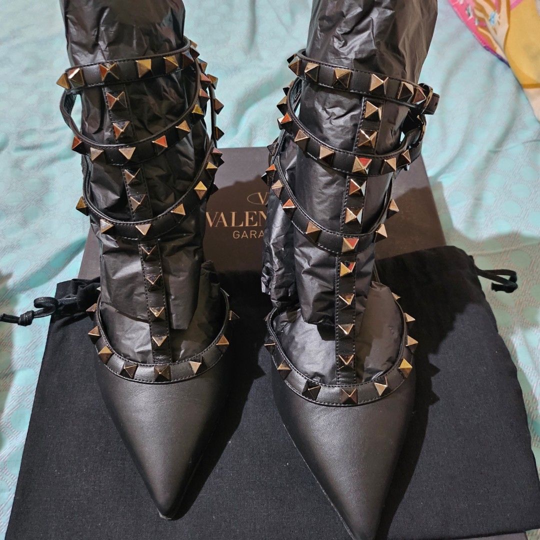 Valentino Garavani Rockstud Heels (Category: Sneakers & Footwear) located in Las Pinas. Submitted by swiftdragon_0c099a (Listing ID 1416781774, Image 3). Description: - Valentino Garavani Rockstud heels - Color: Black - Size: 36.5 - Design: Pointed toe with signature pyramid studs - Features: Straps with pyramid studs - Includes original box - Made in Italy pristine conditions with box dustbag very classy in actual interested please just message 