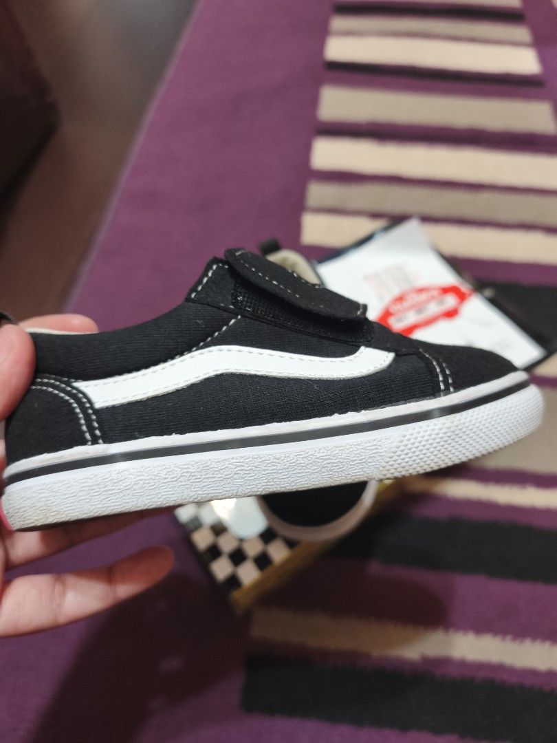 Vans Old Skool Black Toddler Shoes (Category: Babies & Kids Fashion) located in Manila. Submitted by annabbee1 (Listing ID 1416646349, Image 2). Description: Authentic Vans Old Skool toddler shoes - Black color, size 16.5 cm - Hook-and-loop closure for easy wear - Classic white stripe and sole - Vans logo on insole - Includes original box and tags - Used twice only.
