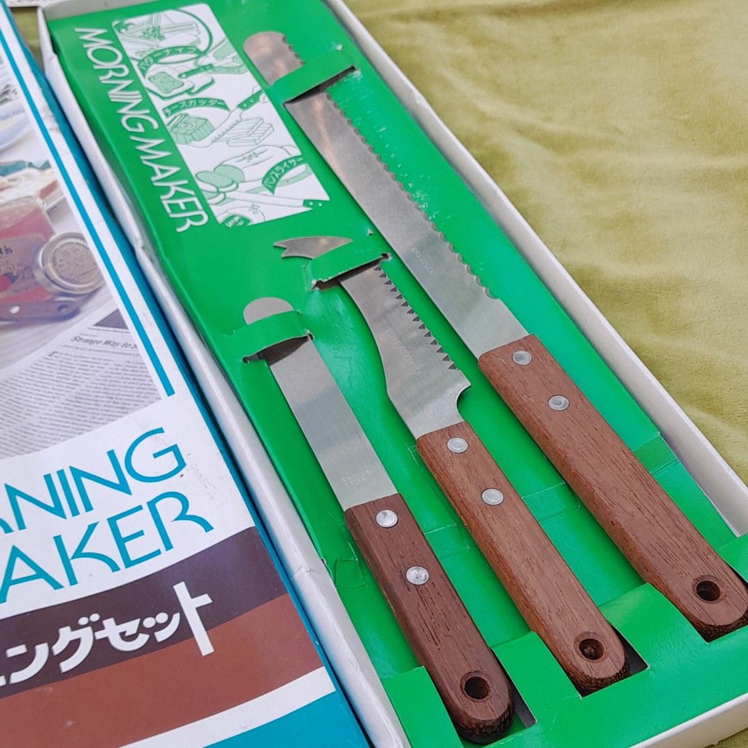 Vintage Knives Boxed Set (Category: Dinnerware & Cutlery) located in Las Pinas. Submitted by 84vintage (Listing ID 1416679211, Image 2). Description: Box#2 Maganda pang gift. Vintage vibe, Morning Maker multi-purpose knife set, from the 70s or 80s when they made the best items. The set includes a large serrated knife, a smaller serrated utility knife, and a small paring knife. The knives feature wooden handles and stainless steel blades. The set 