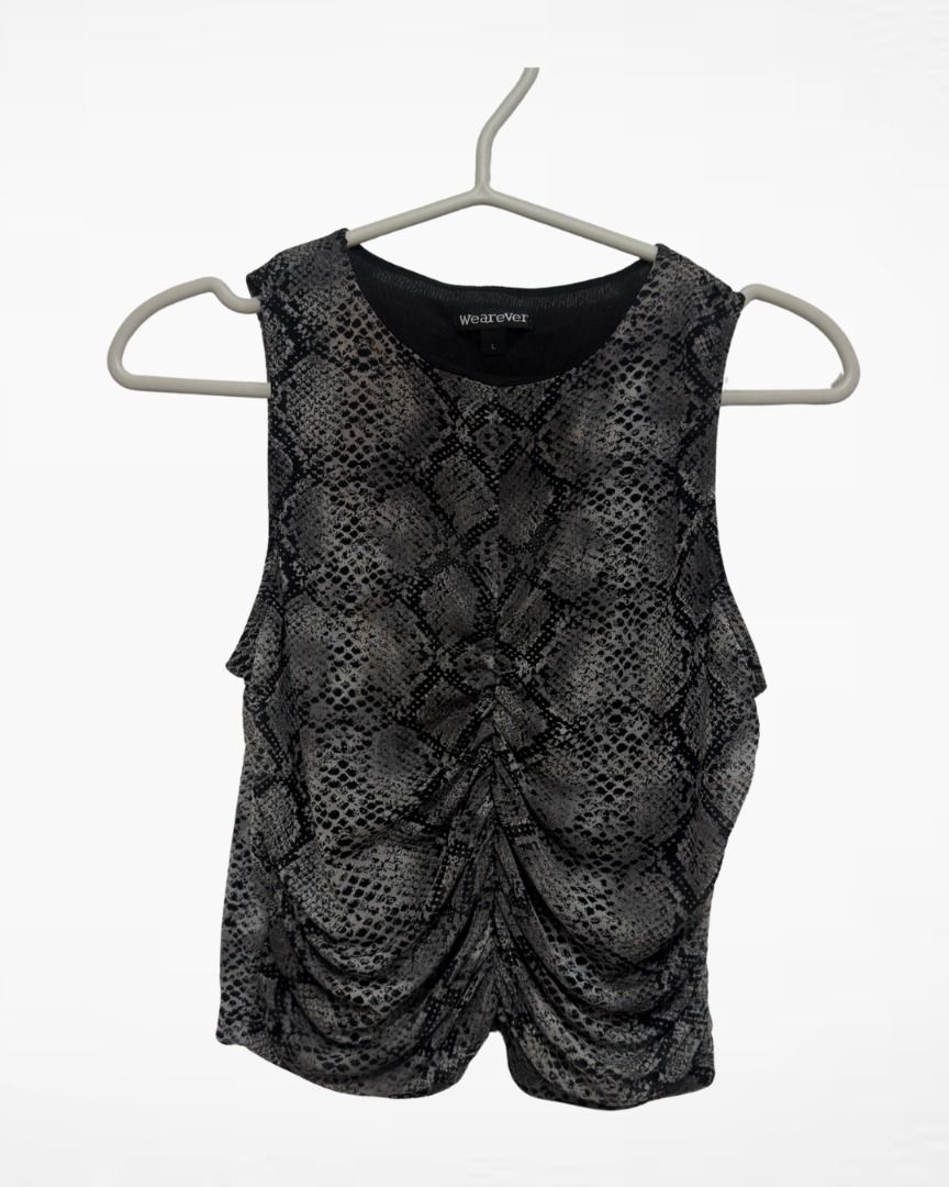 WearEver Snake Print Cropped Top M-L (Category: Others Tops) located in Manila. Submitted by sisterettes (Listing ID 1416692545, Image 1). Description: - WearEver brand - Sleeveless top - Snake print design - Ruched front detail - Lightweight fabric - Ideal for warm weather.