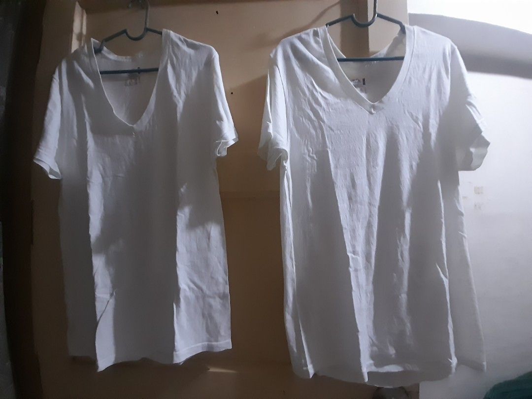 2-For -1 White V-Neck T-Shirts (Category: Shirts) located in Caloocan City. Submitted by lourdespad77562 (Listing ID 1416794003, Image 1). Description: - Two white V-neck t-shirts - Short sleeves - Lightweight fabric - Simple design - Classic and versatile - Ideal for everyday wear.