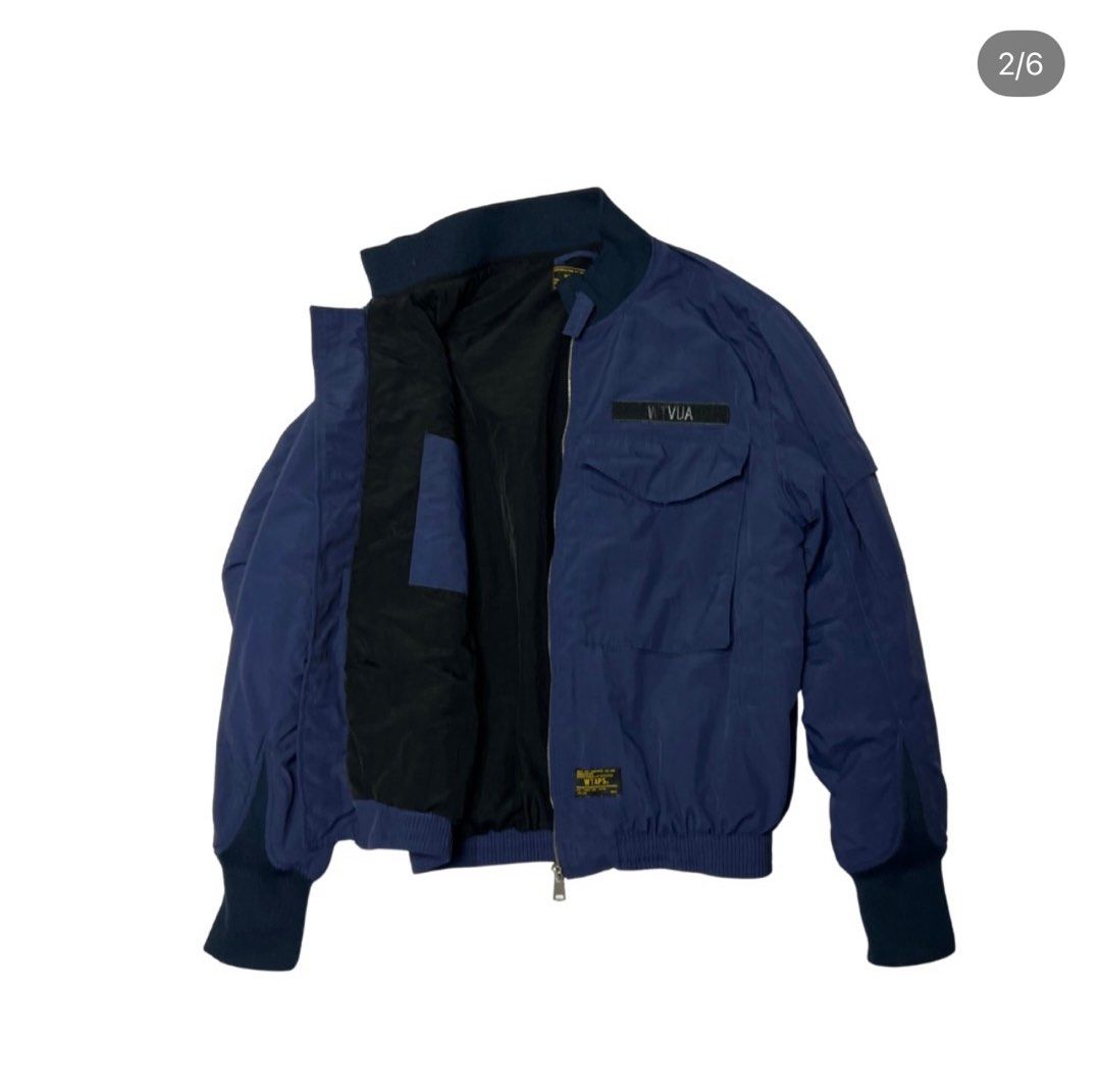 WTAPS Bomber Jacket (Category: Coats, Jackets and Outerwear) located in Paranaque City. Submitted by greentowncollective (Listing ID 1416813592, Image 2). Description: Size: Size 3 on tag 22x28 Condition: Like new Color rate: 10/10 Flaws: None .