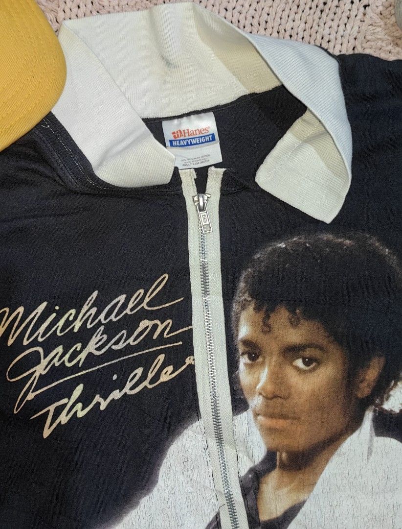 Y2K Michael Jackson Thriller Customized with collar and zipper (Category: Tshirts & Polo Shirts ) located in Tuguegarao City. Submitted by ekko_bag2 (Listing ID 1416725893, Image 3). Description: in good condition - customized with collar and zipper - powered by Hanes Heavyweight - dated 2009 - Small sayin on collar - hairline cracks on print - no pinhole Dimension in inches L x W - 26.5 x 17 (pit to pit) Mode of payment - Gcash Payment first, No