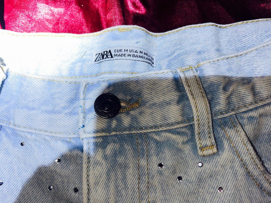 Zara Denim Shorts with Rhinestones (Category: Shorts) located in Cavite. Submitted by declutterringggggg (Listing ID 1416780918, Image 2). Description: - Zara denim shorts - Light wash - Rhinestone embellishments - Frayed hem - Button closure - Pockets - Size M - Like new .