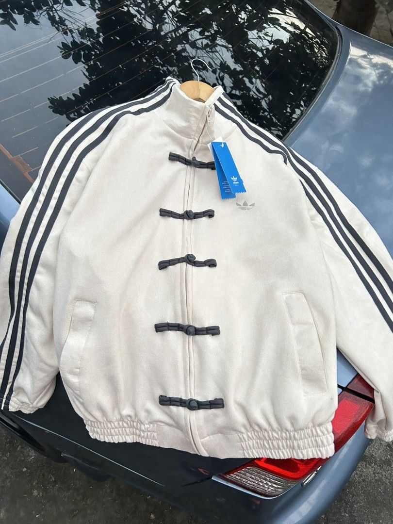 ADIDAS CHINESE NEW YEAR JACKET (Category: Coats, Jackets and Outerwear) located in Taguig. Submitted by patrickbas46594 (Listing ID 1416883648, Image 2). Description: BRANDNEW WITH HANGTAG ‼️ SIZE: SMALL, MEDIUM ✅️ OTHER SIZES AVAILABLE FOR PRE ORDER 📌 TAGUIG LOWER BICUTAN 📍 DM ME FOR MORE DETAILS 📩.