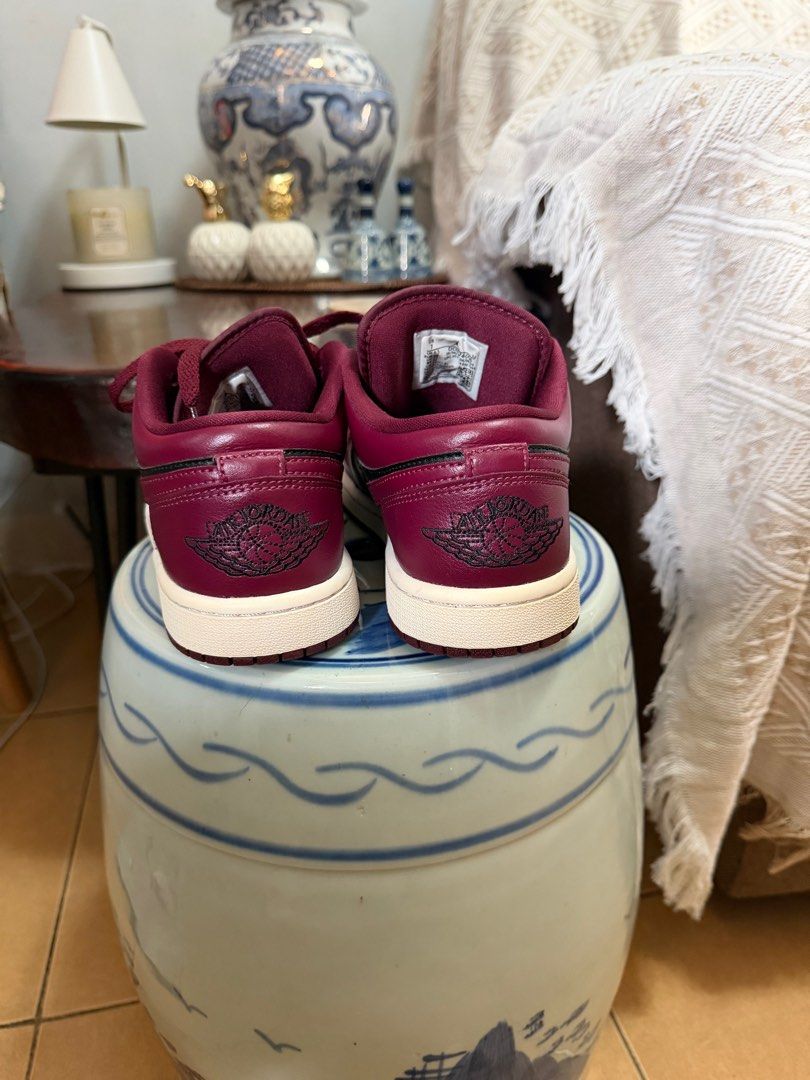 Air Jordan 1 Low - Maroon/Black (Category: Sneakers) located in San Juan City. Submitted by vmdln (Listing ID 1416917220, Image 2). Description: - Air Jordan 1 Low sneakers - Maroon and black colorway - Features Nike swoosh - Air Jordan wings logo on heel - White midsole - Maroon laces - Classic and stylish design.
