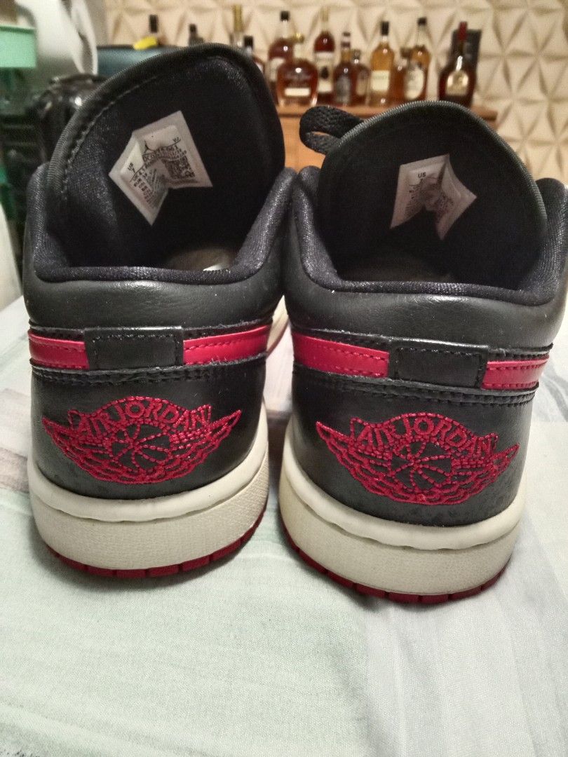 Air Jordan 1 Low Black Red (Category: Sneakers) located in Marikina City. Submitted by jaebe (Listing ID 1416985006, Image 3). Description: - Air Jordan 1 Low sneakers - Black upper with red accents - Iconic Nike swoosh and Air Jordan logo - White sole with red outsole - Size: US 7, EUR 38, CM 24 - Made in Vietnam.