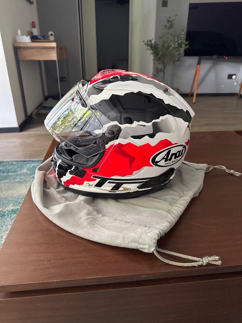 Arai RX-7 GP Doohan TT Helmet (Category: Motorcycle Apparel) located in Singapore. Submitted by fiqo71 (Listing ID 1416846340, Image 2). Description: Size L Bought in 2019 Well maintained Top inner padding need to change. Small chip on the back. Urgent sale!! .
