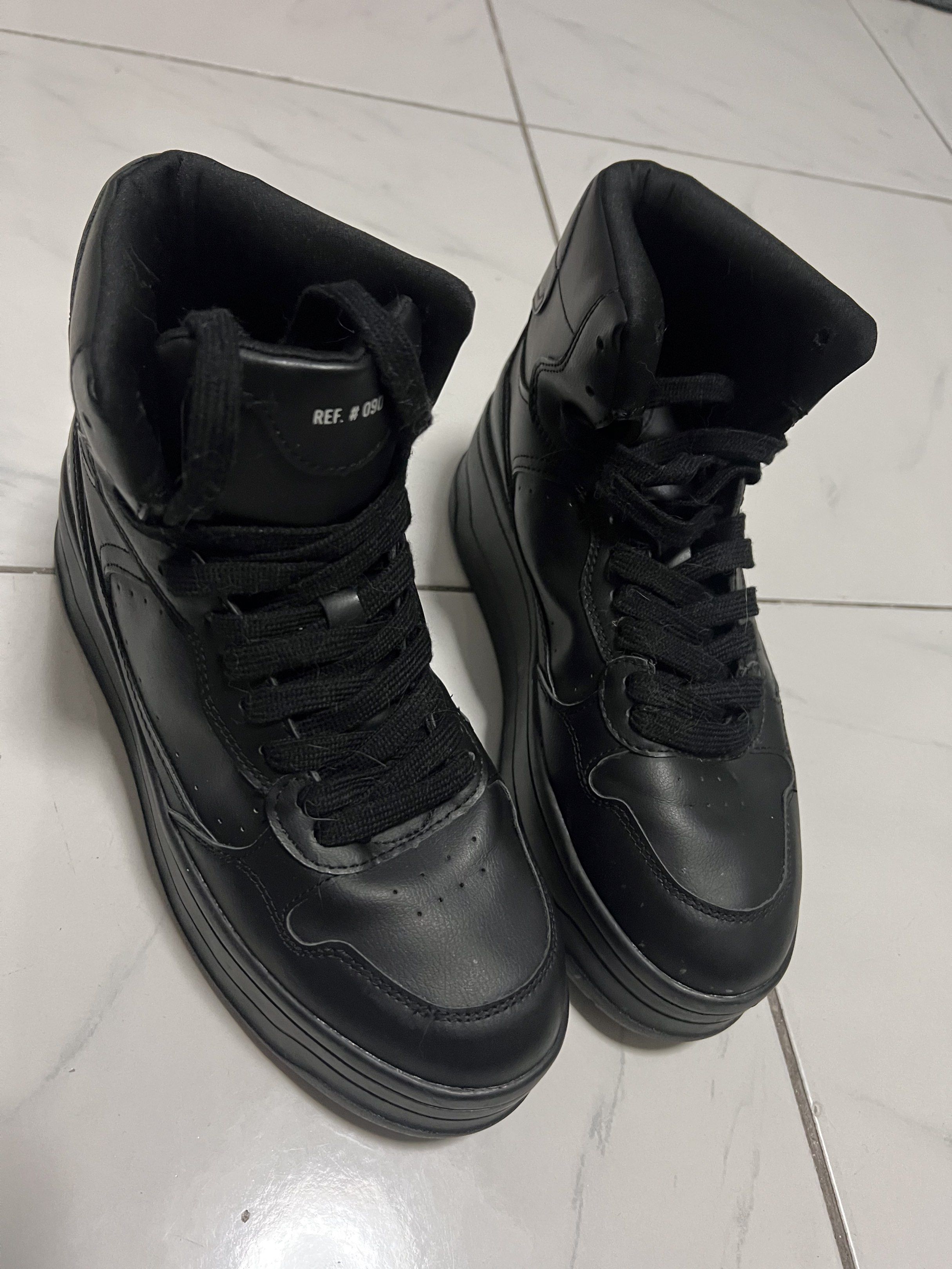 Bershka High-Top Sneakers (Category: Sneakers) located in Manila. Submitted by lanzyhowell (Listing ID 1417008473, Image 1). Description: (Negotiable if buying multiples) - Bershka high-top sneakers - Size 40 - All-black design - Thick sole - Lace-up closure - Leather-like material - Ref. #090.