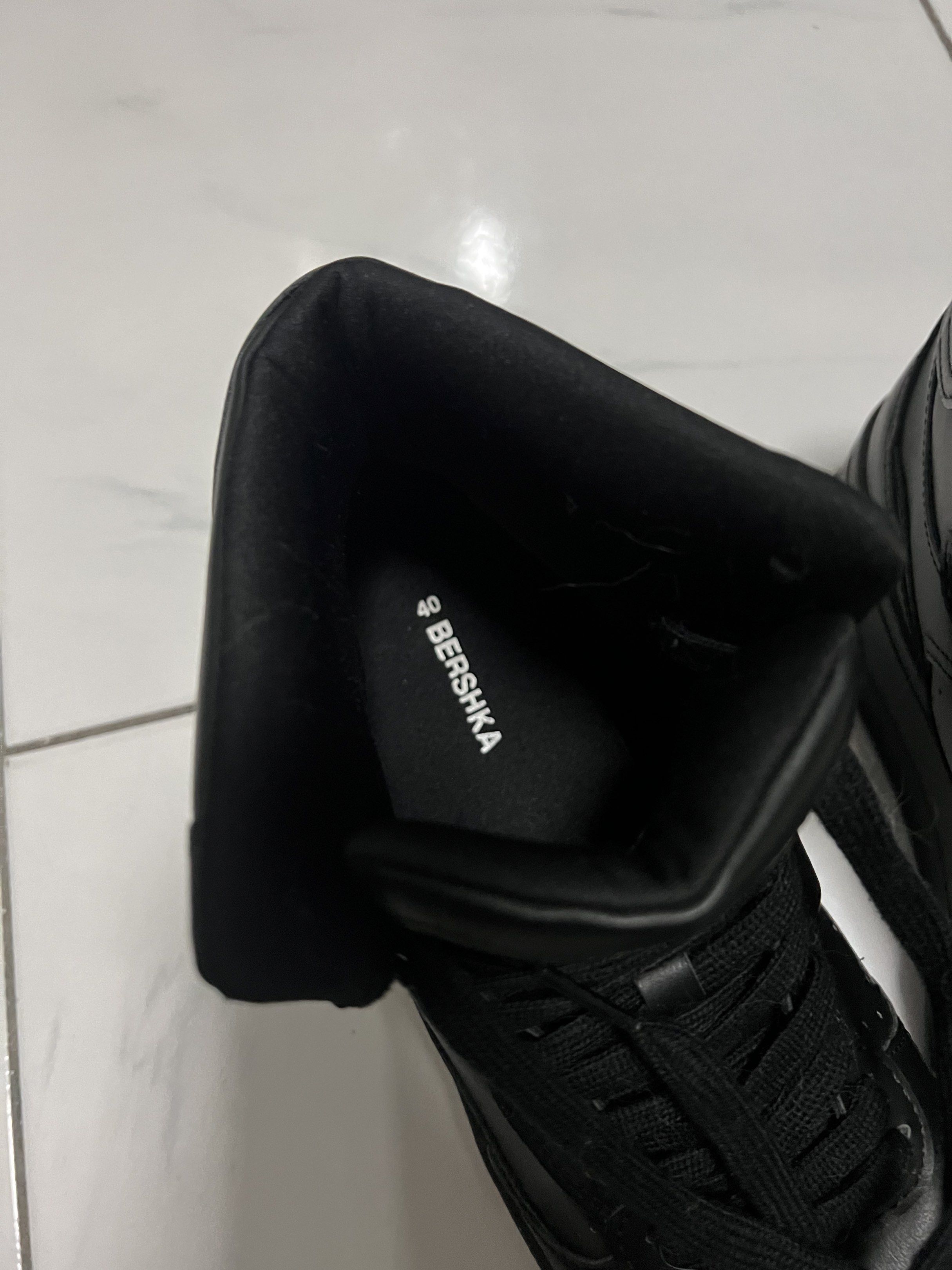 Bershka High-Top Sneakers (Category: Sneakers) located in Manila. Submitted by lanzyhowell (Listing ID 1417008473, Image 3). Description: (Negotiable if buying multiples) - Bershka high-top sneakers - Size 40 - All-black design - Thick sole - Lace-up closure - Leather-like material - Ref. #090.