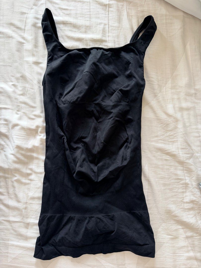 Blanqi Shapewear Tank Top - Black - Medium (Category: Maternity wear) located in Quezon City. Submitted by erchibu (Listing ID 1416850496, Image 1). Description: - Black Blanqi shapewear tank top - Size: Medium - Features: Scoop neck, wide straps - Material: 90% nylon, 10% spandex - Care Instructions: - Machine wash cold, gentle cycle - Do not bleach - Do not iron - Do not dry clean.